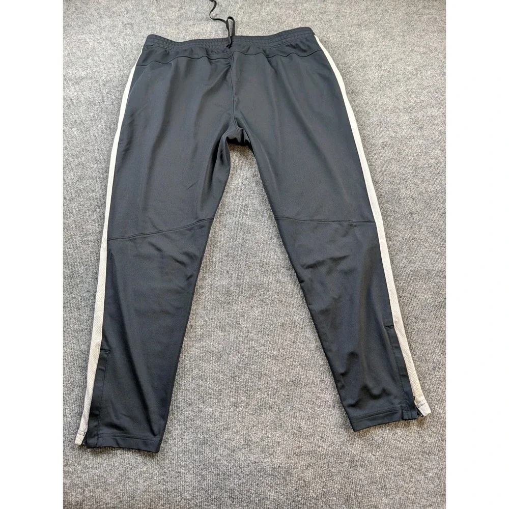 Under Armour Mens Track Pants Size 2XL Black White Stripe Ankle Zippers 1313201